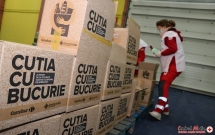 1.300 de familii în dificultate vor primi „Cutia cu Bucurie” cu alimente de bază, de la Crucea Roșie Română și Carrefour România